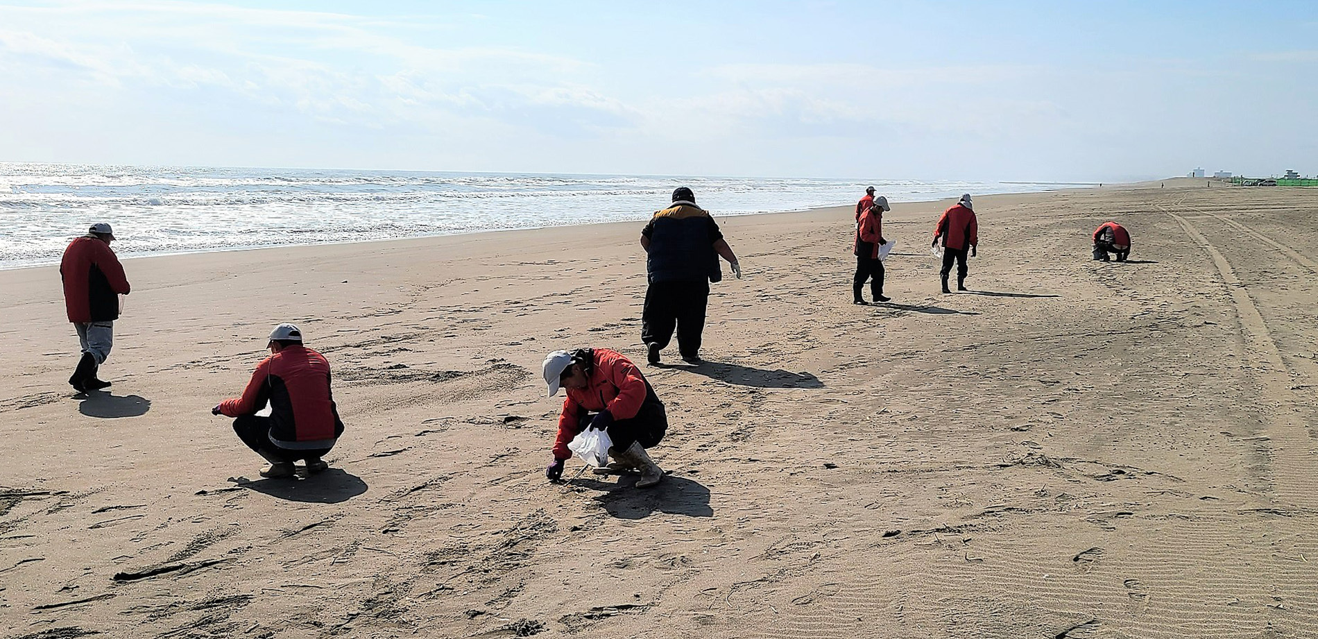 利用者様と砂浜
